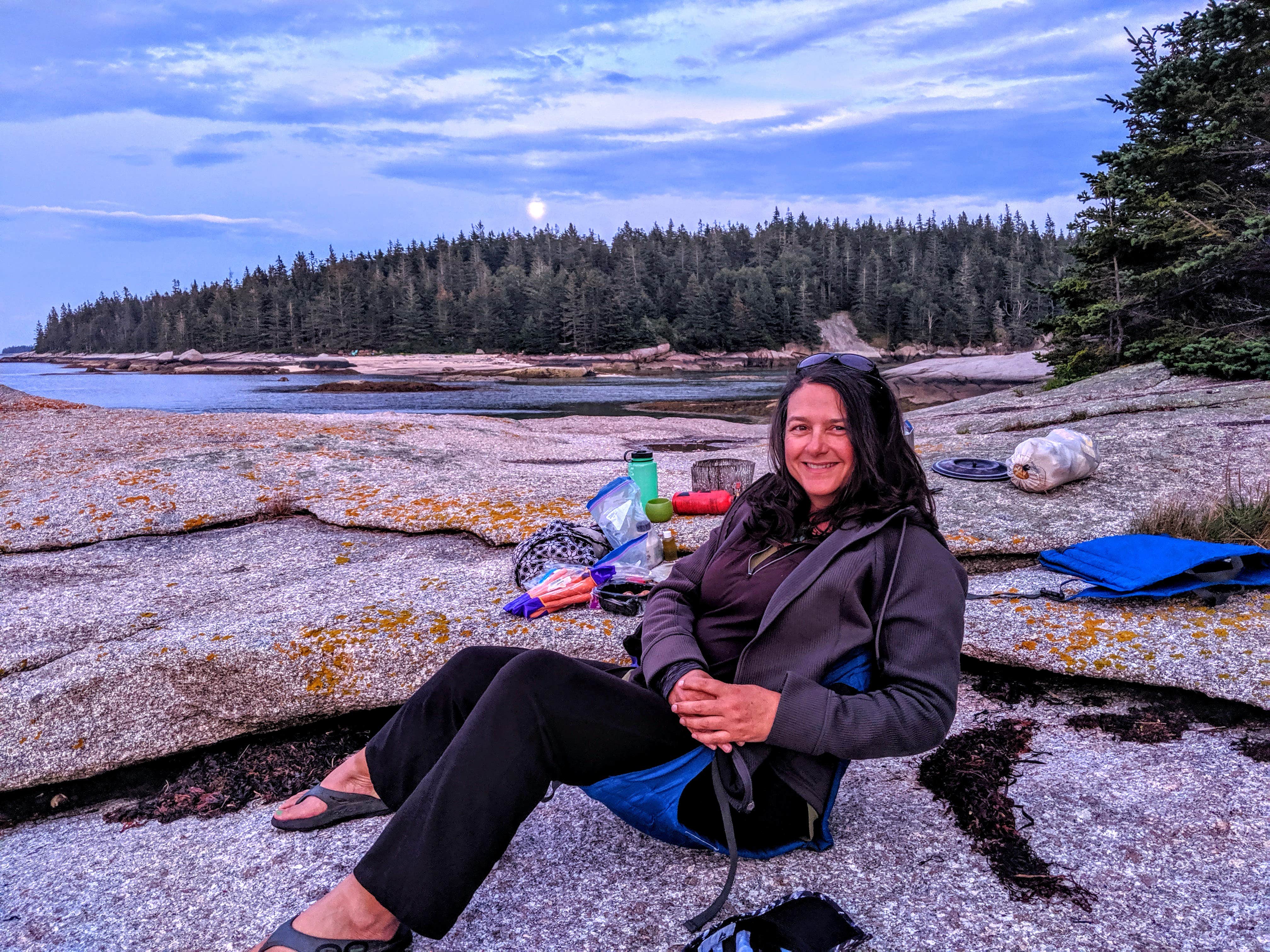 Shari and the full moon peaking up over the trees.