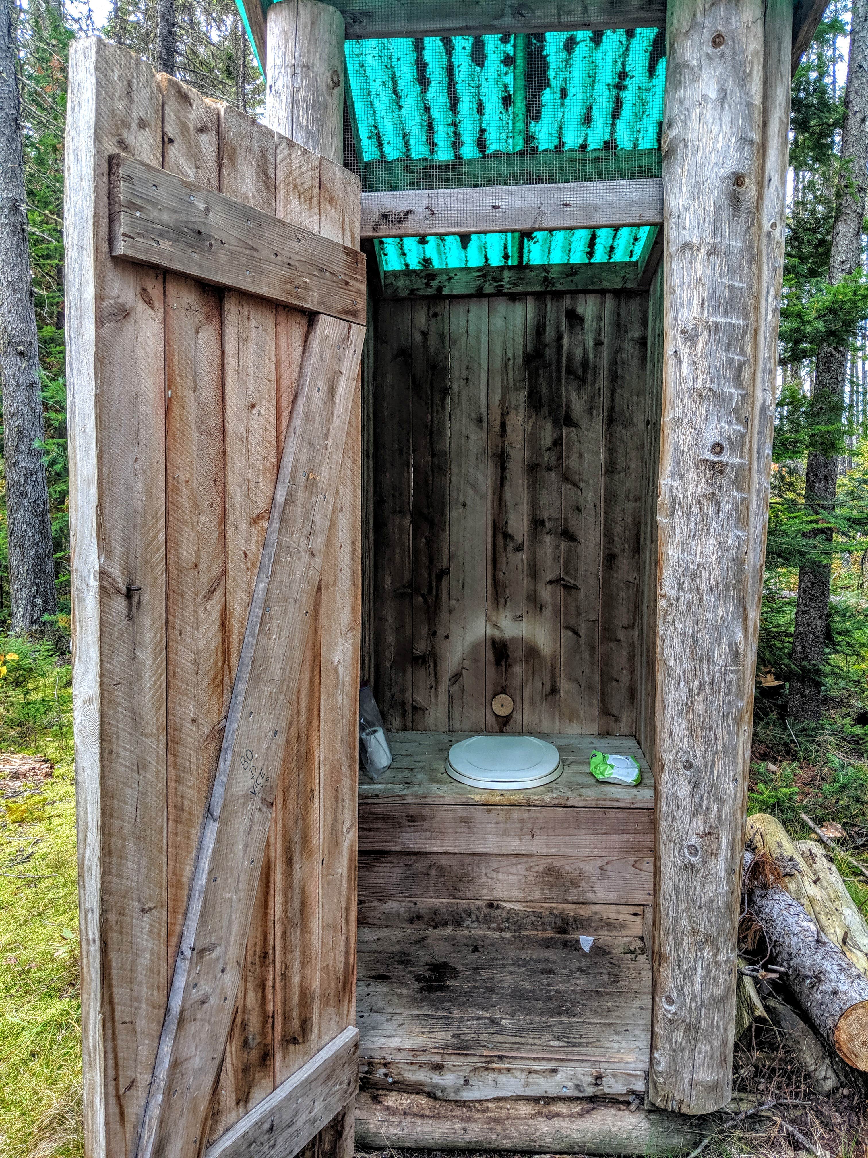 Tucked way back in the woods, you have your own private latrine.