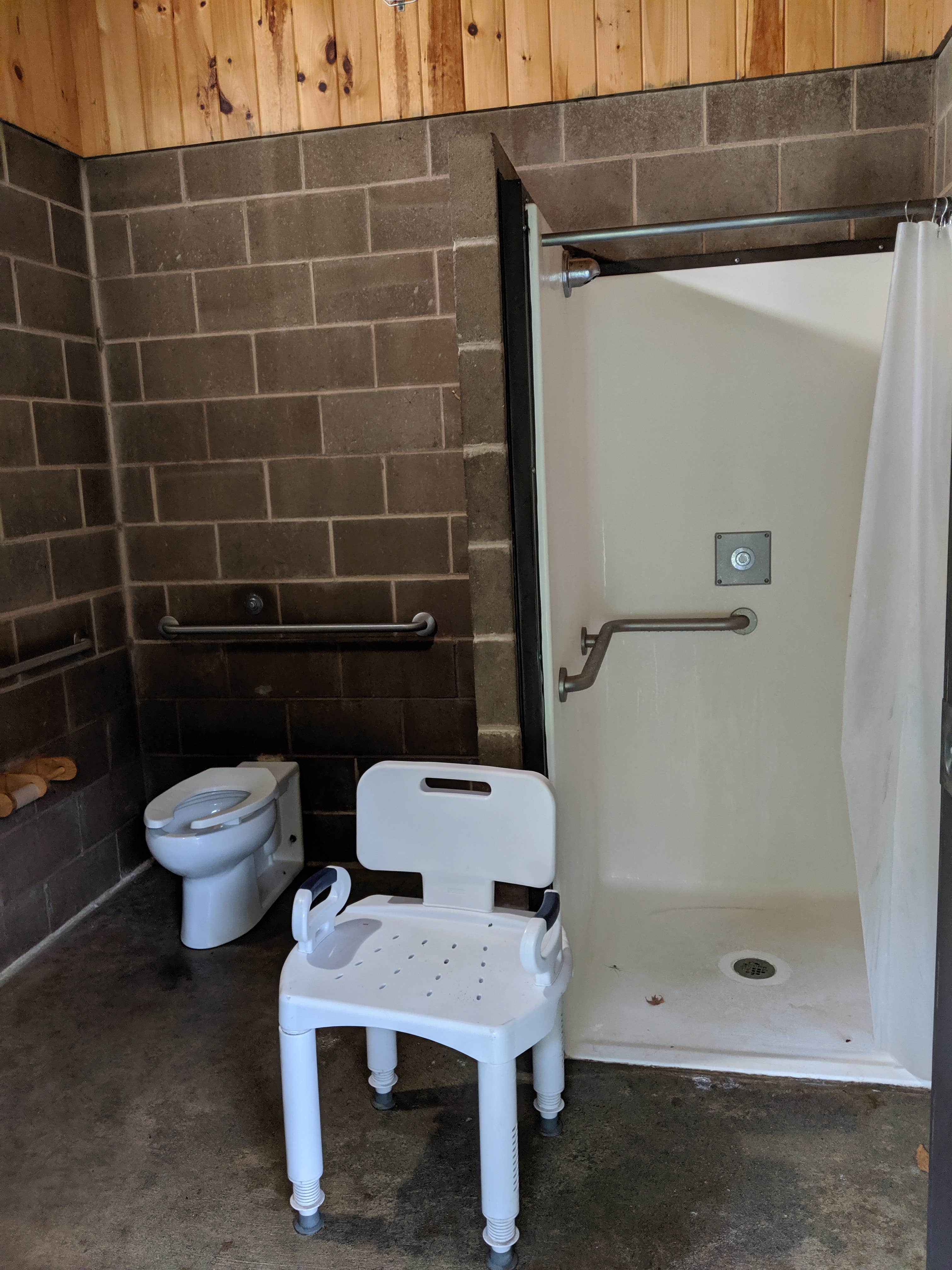 Clean showers, each with their own toilet and sink.