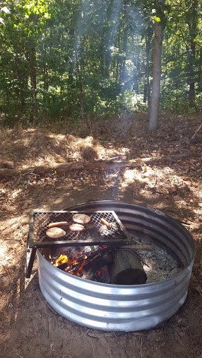 Firepit grilling on the campground in one of our primitive tent sites.