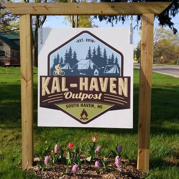 Kal-haven Outpost sign marking the campgrounds entrance.