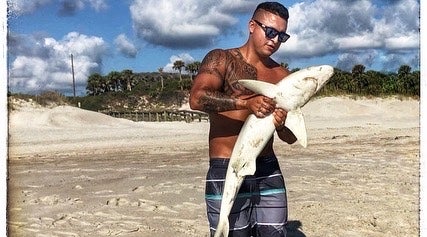 Shore fishing- he caught a shark next to me.  Video on our YouTube channel