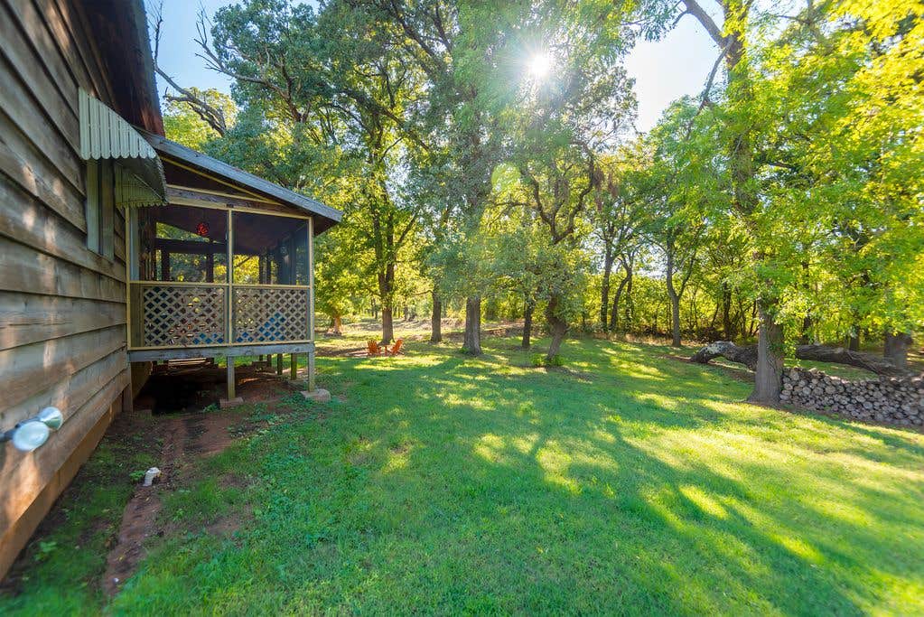 Camper submitted image from Cabin nestled among trees, just outside of OKC - 4