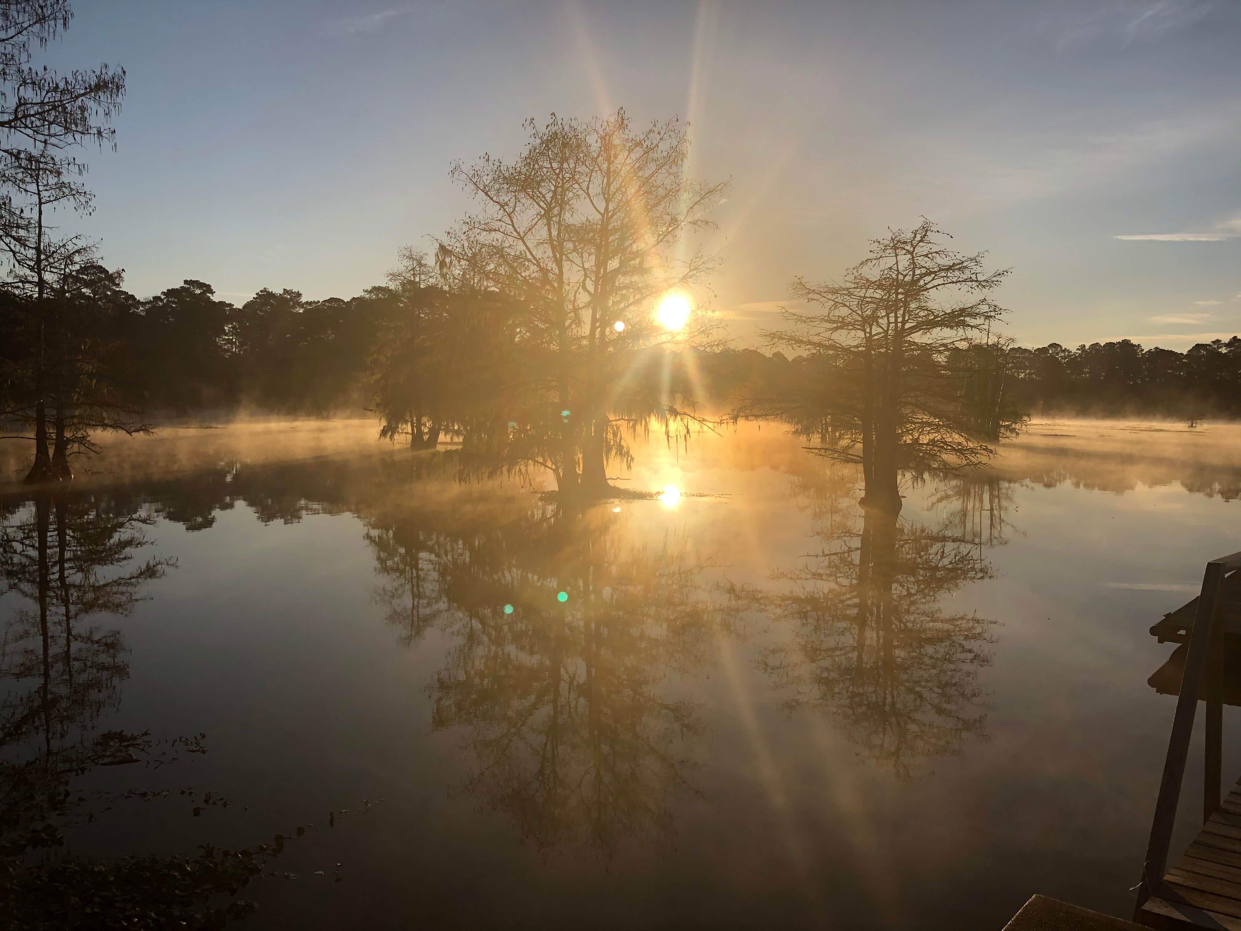 Sunrise from pier at boat ramp outer loop