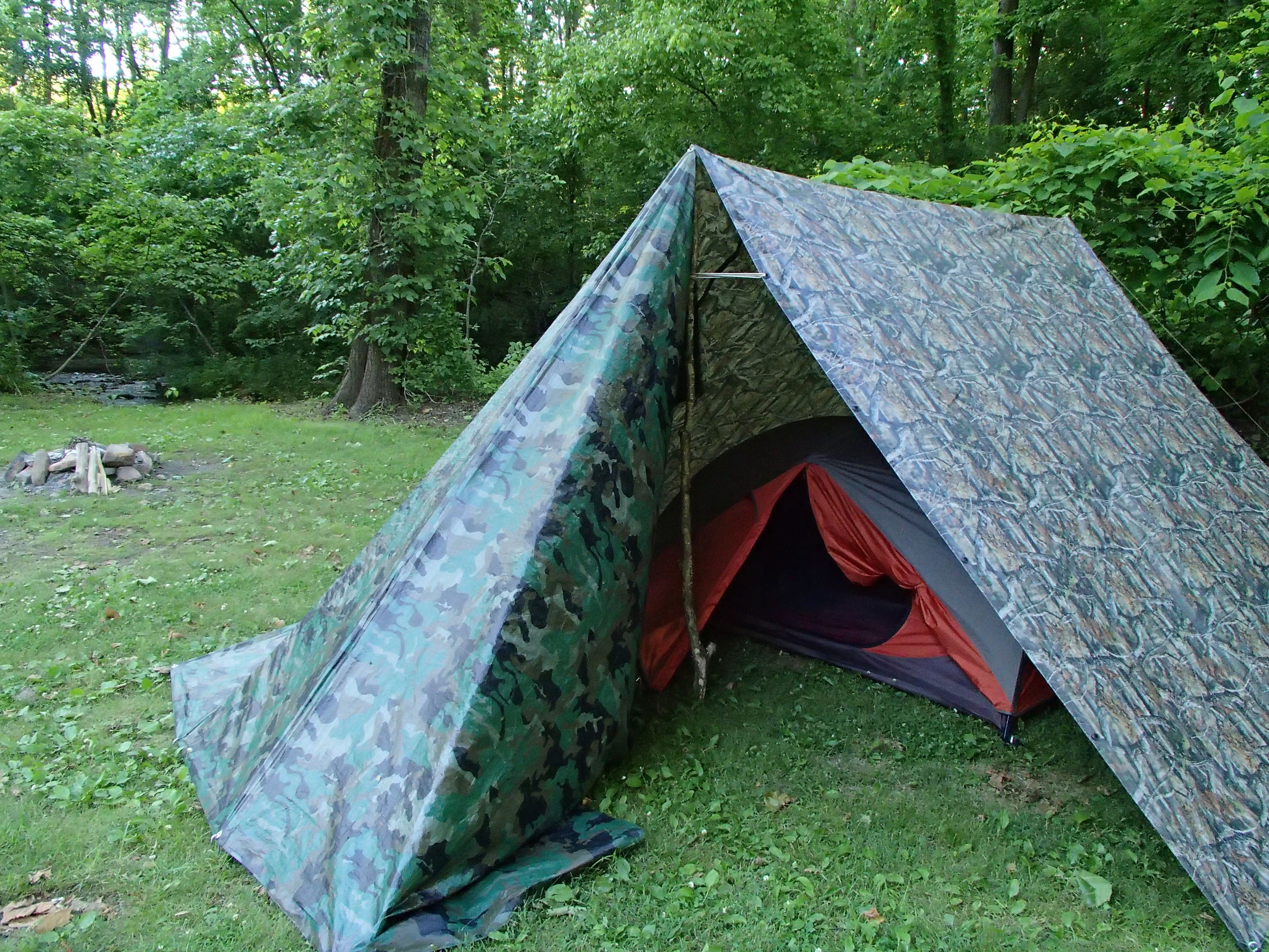 This is the only way to stay dry camping in the Virginia's...the fine art of tarping.
