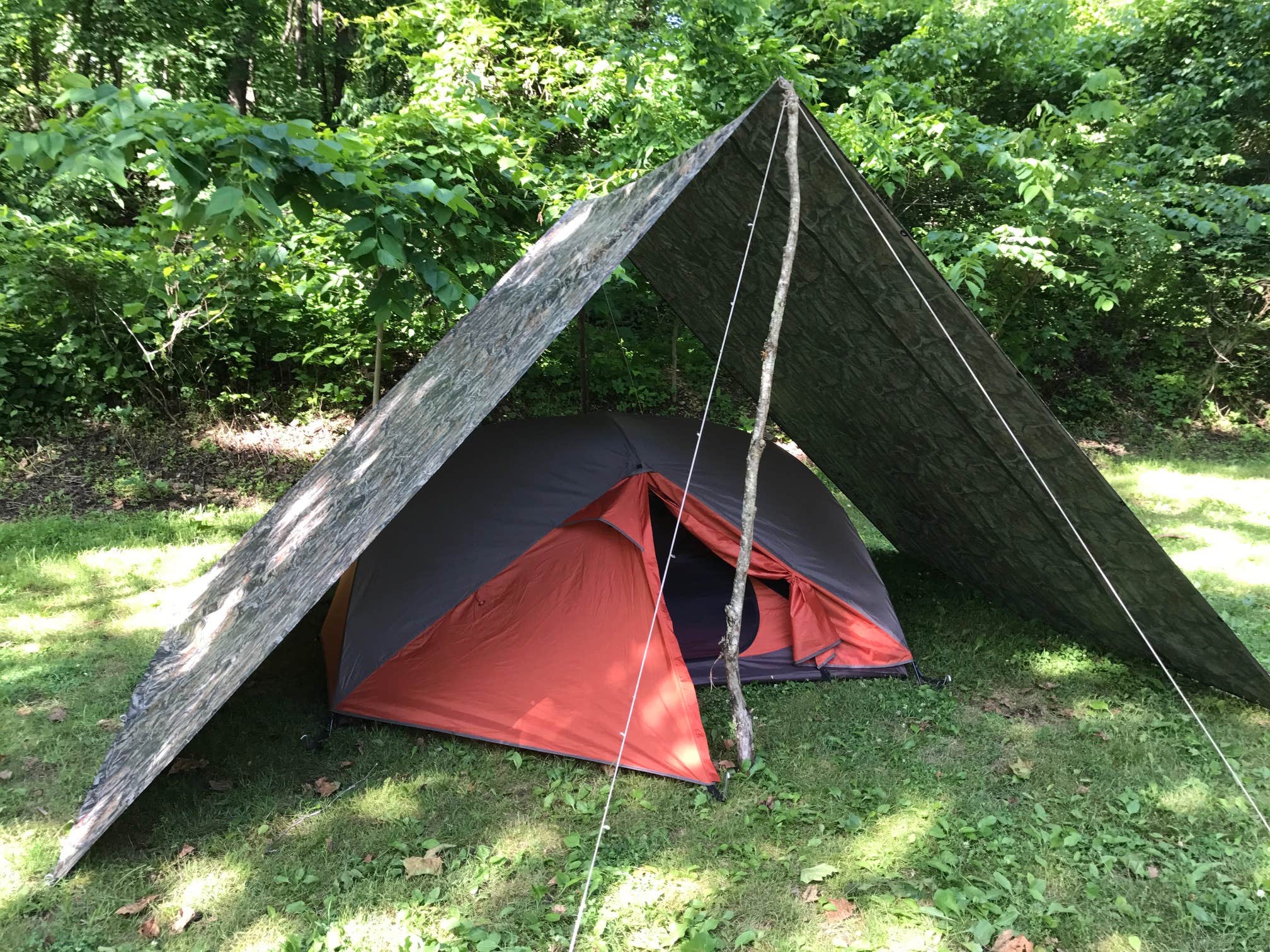 Thankful for downed branches found at a previous campground. Note to self...buy adjustable tarp poles.
