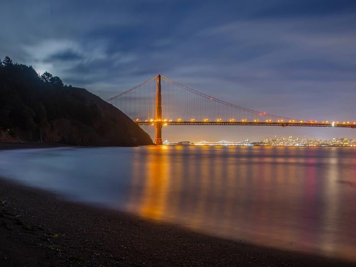 A view of the bay from Kirby Cove, with the Golden Gate Bridge lit.



Kirby Cove offers beach access with a view of the Golden Gate Bridge.

Credit: Alison Tagart Barone NPS
