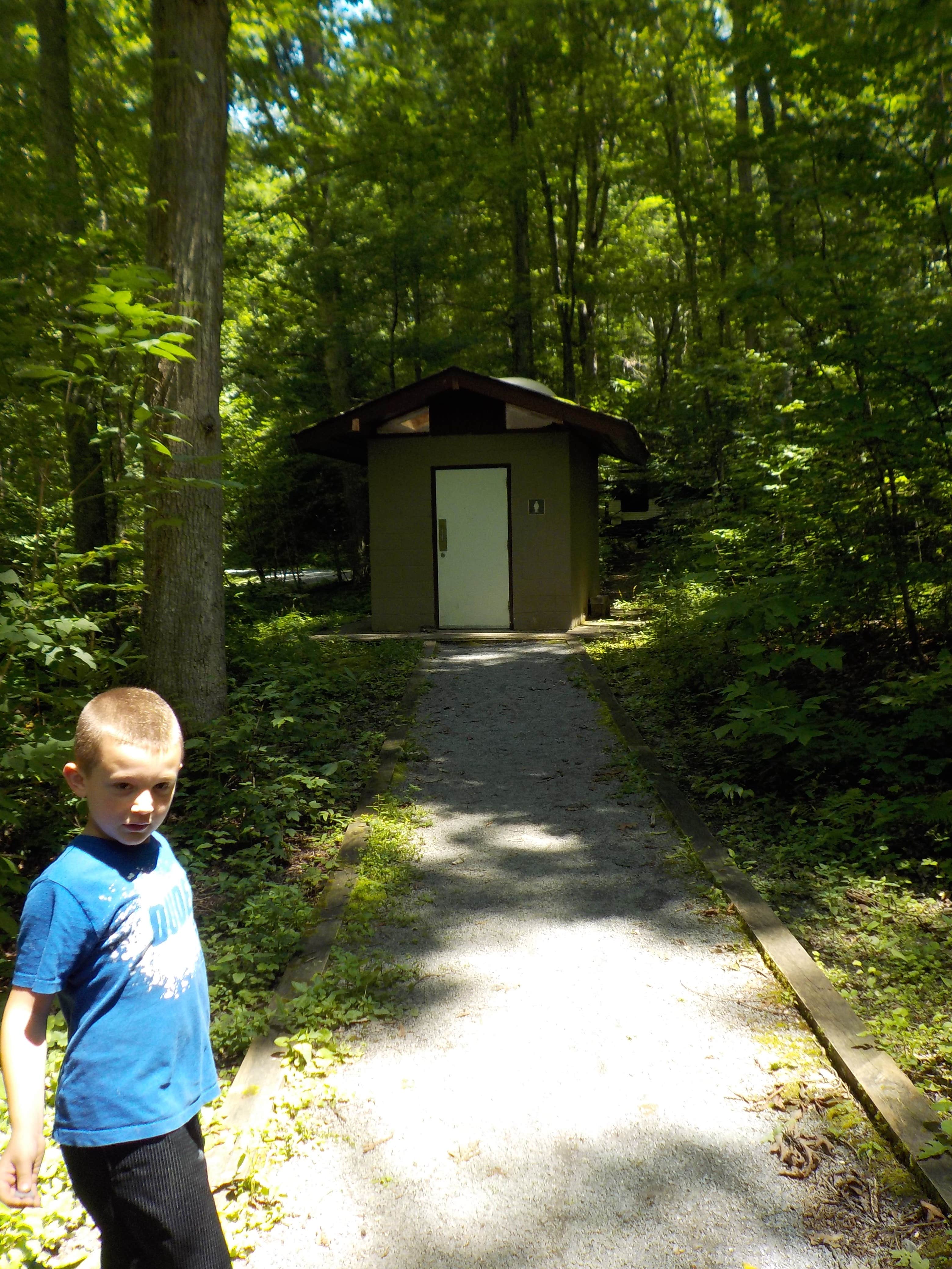The bathroom,  It is small and only 2  one for women and one for men on the other side  but it serves the purpose  running water with a sink and commode  if you want a shower there is blackbear campground on down the road where you can pay 2 dollars to shower