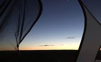 Carrie C.'s photo of tent camping at Moonshine Wash TH near Hanksville, UT