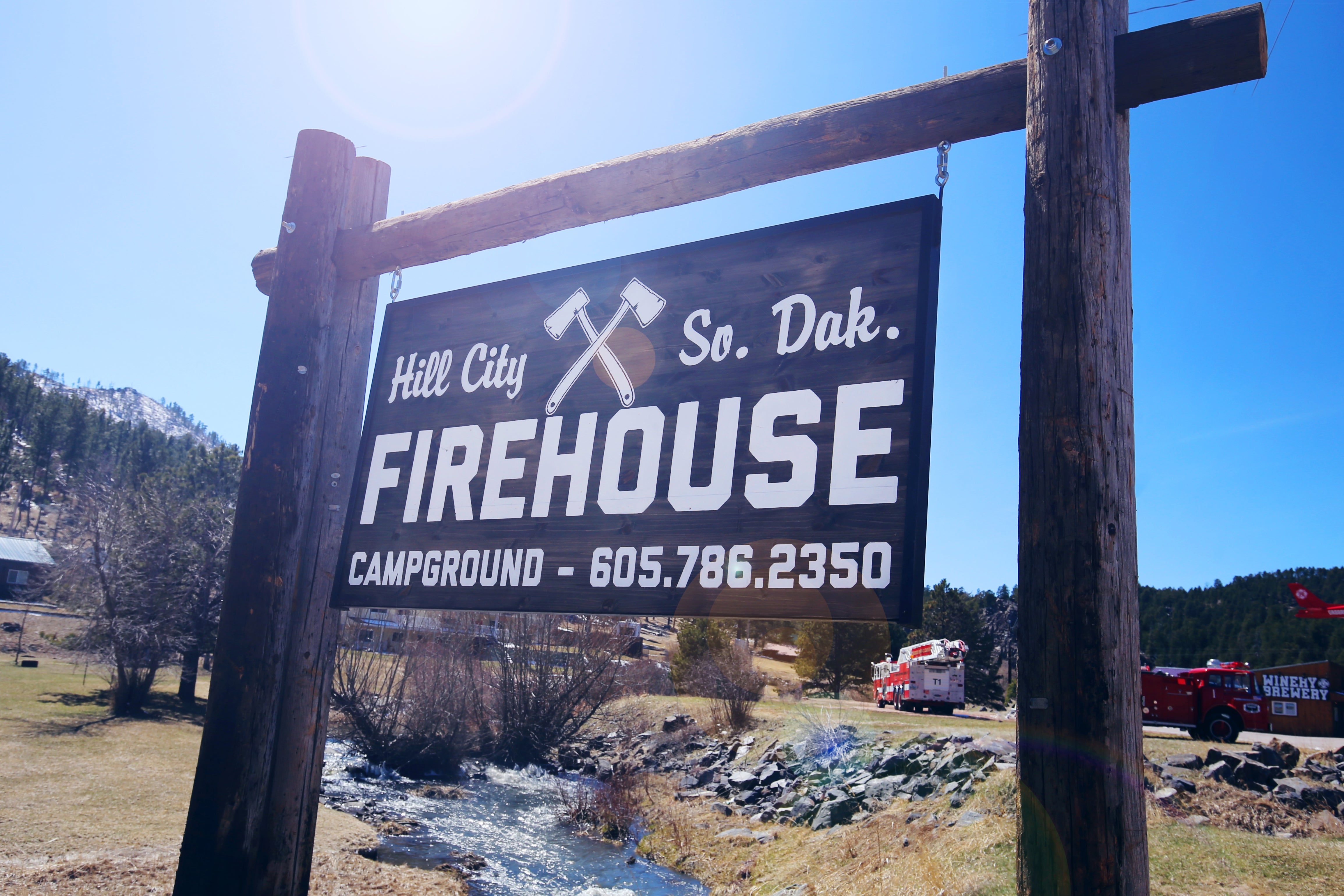 Sign for Firehouse Campground in Hill City
