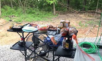 Camping near Wild Oaks Campground and Roadside Cafe: Riverfront Campground and Canoe, Windyville, Missouri