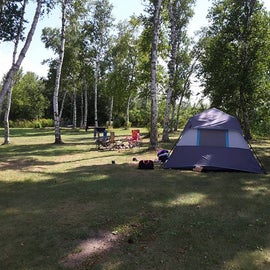 Tent site along the lake shore.  