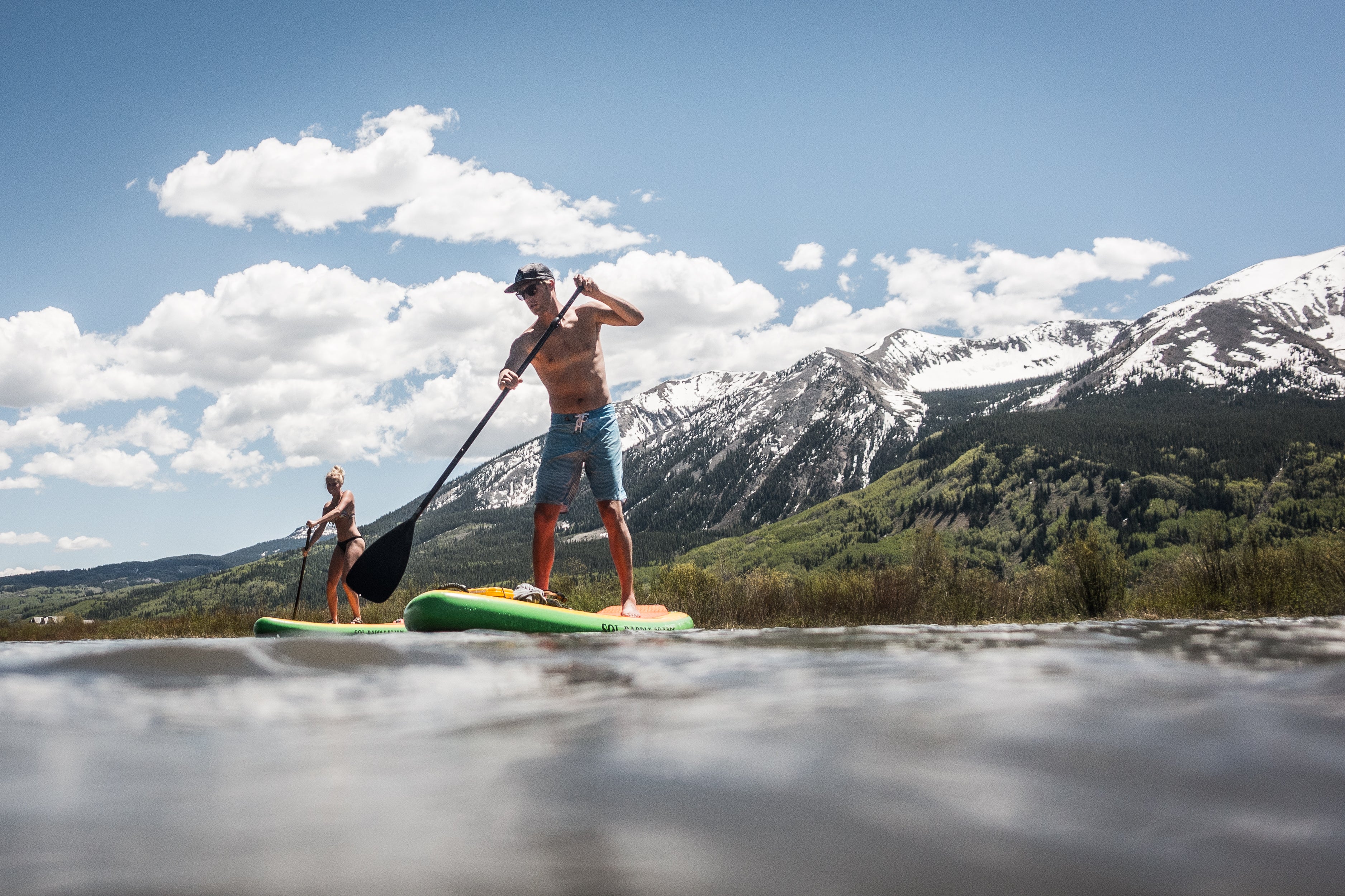 Paddleboarding the Slate River in nearby Crested Butte, CO just 15 minutes from camp.