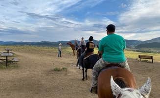 Corrina C.'s photo of camping with a horse at Indian Paintbrush Campground—Bear Creek Lake Park near Westminster, CO