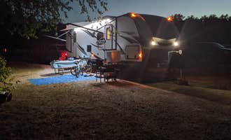 Camping near Croton Dam Float Trips: Sandy Beach County Park, White Cloud, Michigan