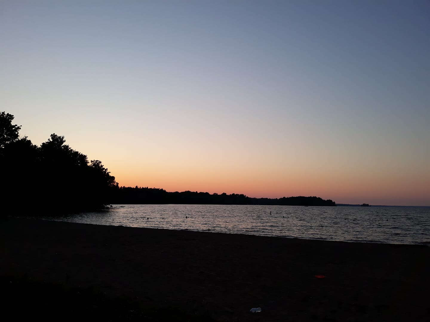 Lake Pymatuning beach area, at sunset.