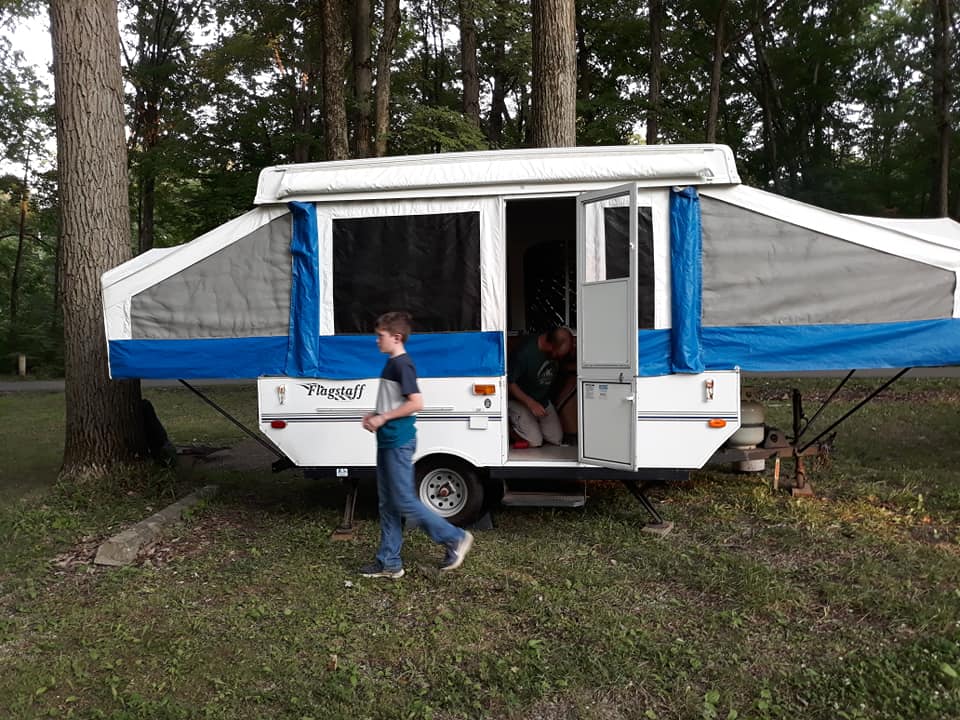 Site J522, setting up our pop-up camper.