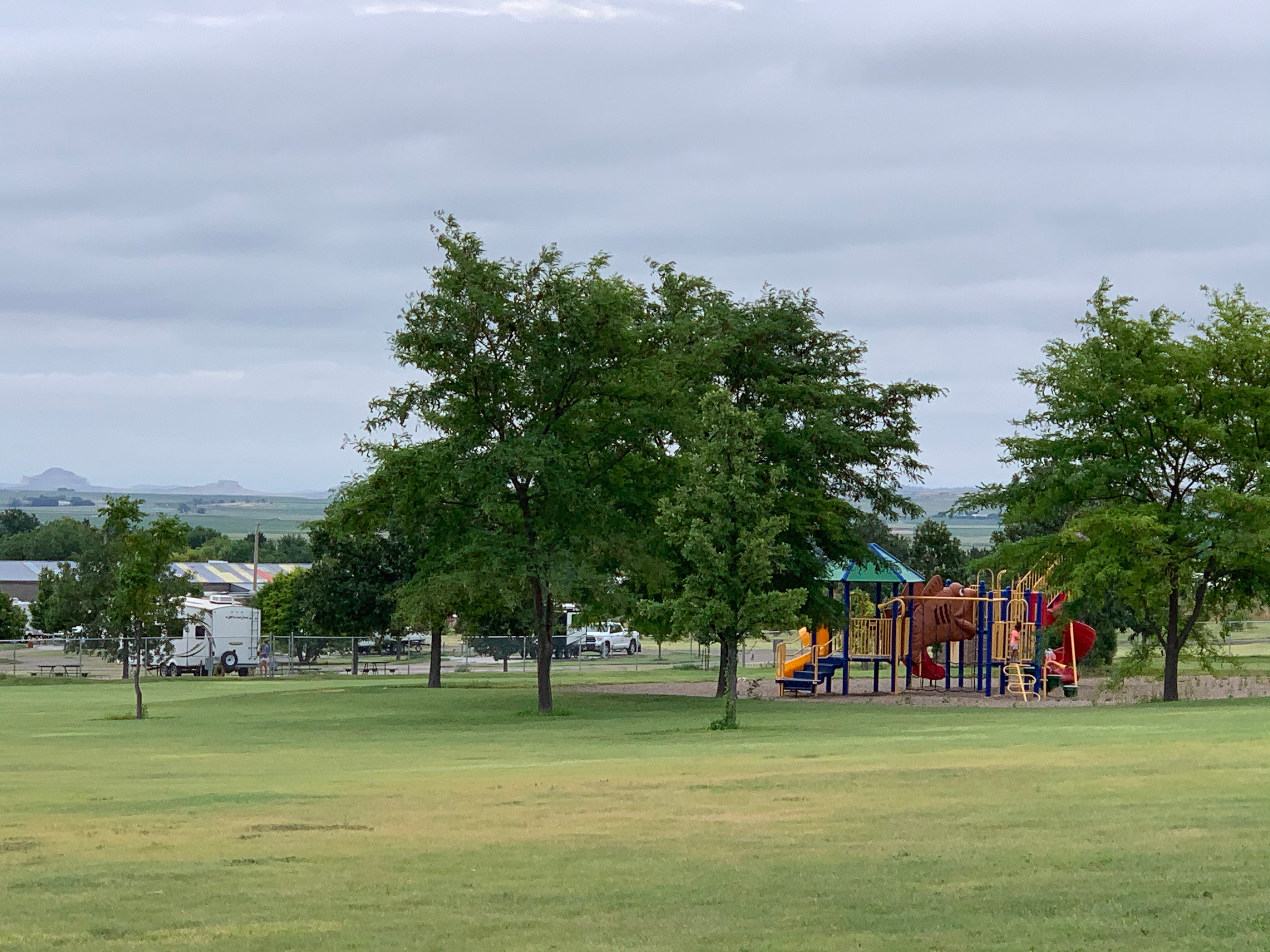 Playground structure in a shared green space between the RV Park and the Five Rocks Amphitheater.
