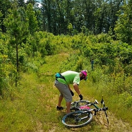 My son and I enjoyed the bike trails.  Here he is adjusting the chain on his bike.