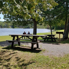 Waterfront with picnic tables