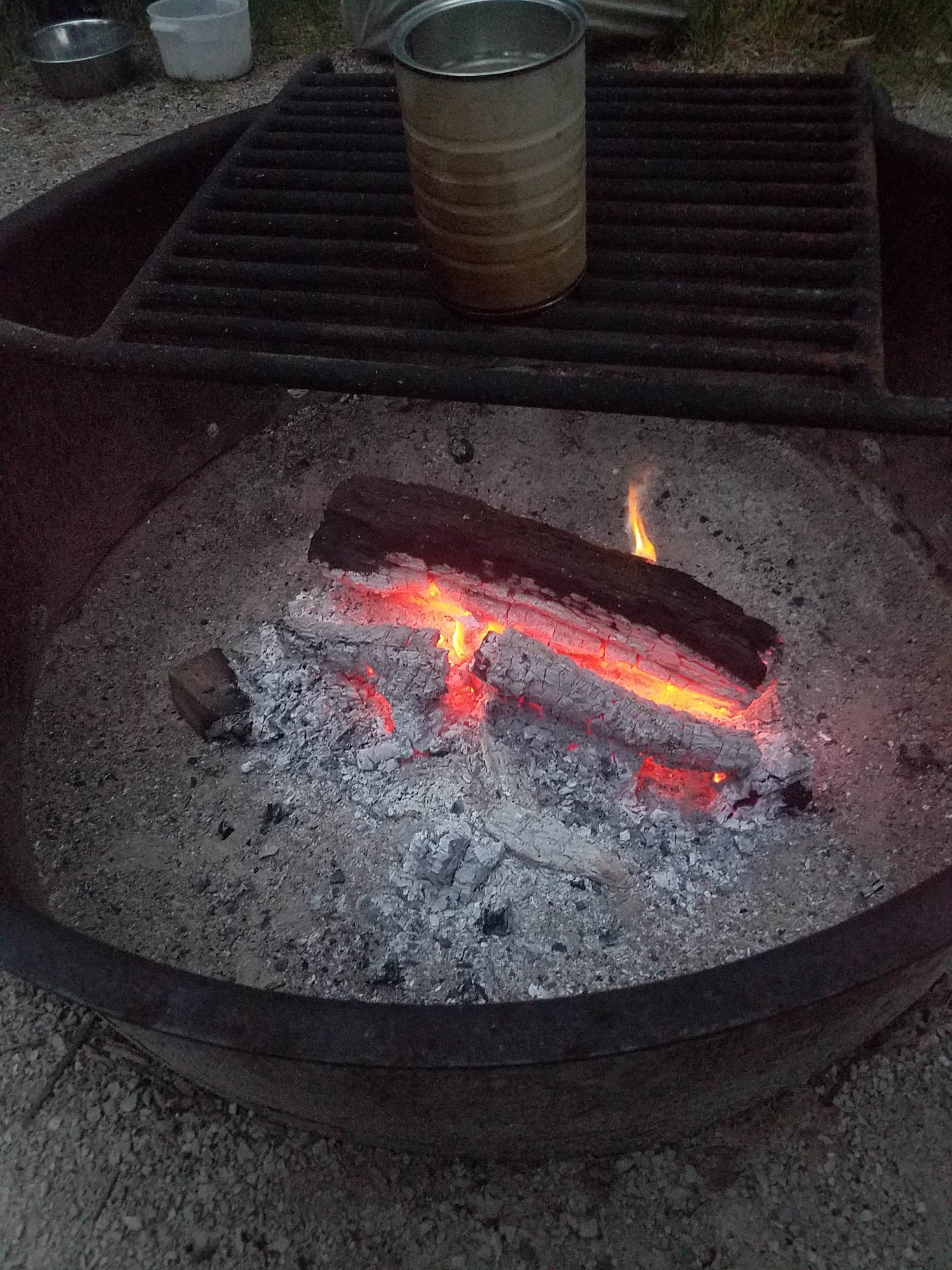 Fire pits are deep with the provided grates. I bring another grate for smaller (lower) fires to use with some lump charcoal for cooking.