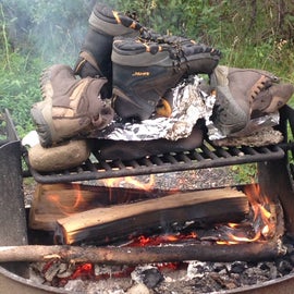 Don't dry your hiking boots directly on the fire