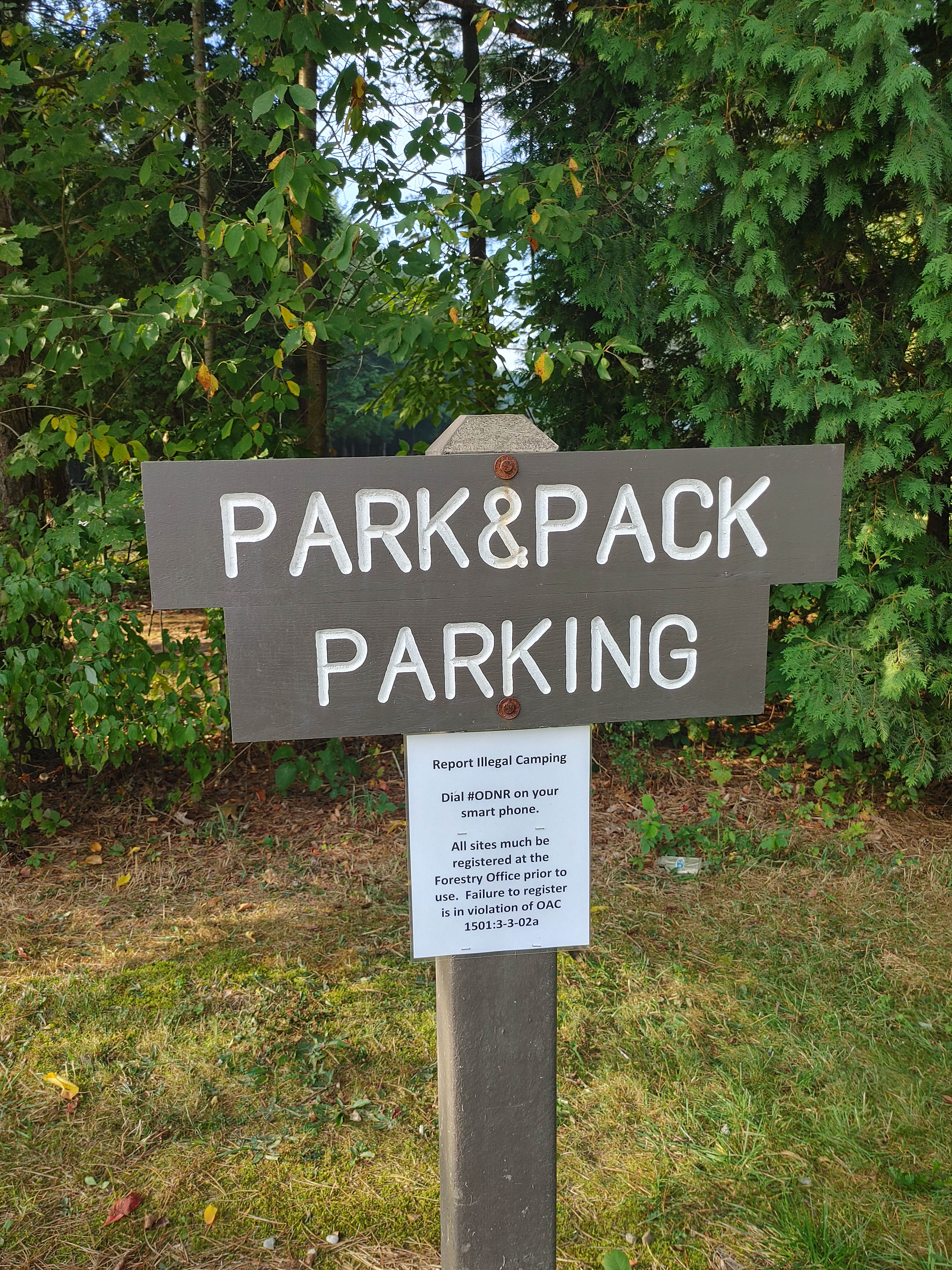We missed this sign two different times. I suspect a car was blocking it. However, it is odd that you don't see a single sign till you are almost out of the parking lot. It feels like an overflow lot but this is the lot for Park and Pack. So don't park where the horses are and their trailers etc.
