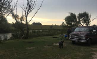 Carmen's photo of camping with pets at Sweet Briar Lake in North Dakota