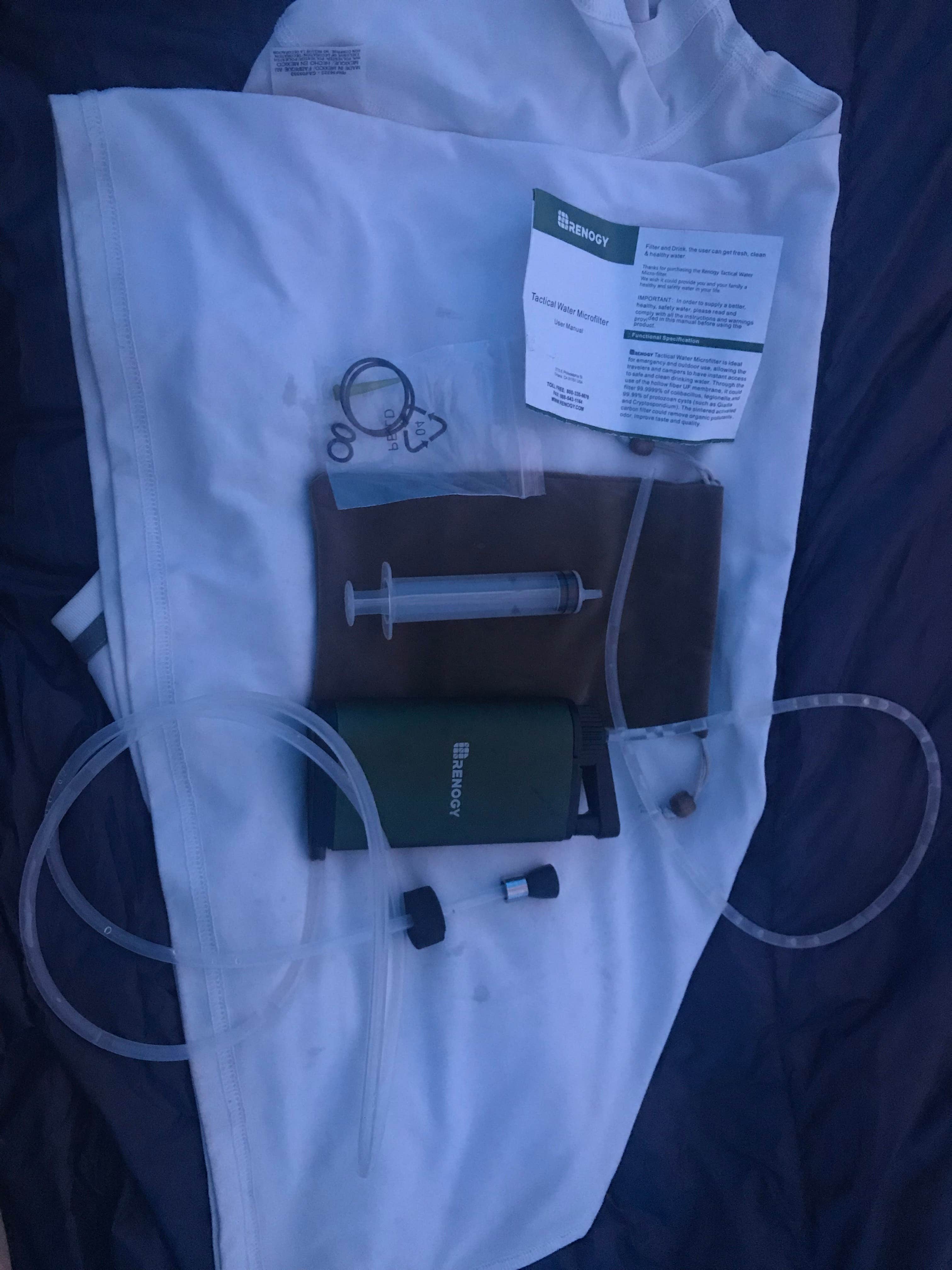 All of the stuff that comes with the filter--tubes, instructions, extra gaskets, carrying case, back flush syringe for cleaning