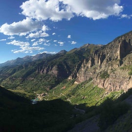 The START of the hike. This is just above Bridal Veil Falls. Note the cars to the right of the frame -- they drove up (we did). Park overnight, just leave enough room for the one lane traffic and maybe put some rocks under the tire.s Telluride just down the way in the valley. 