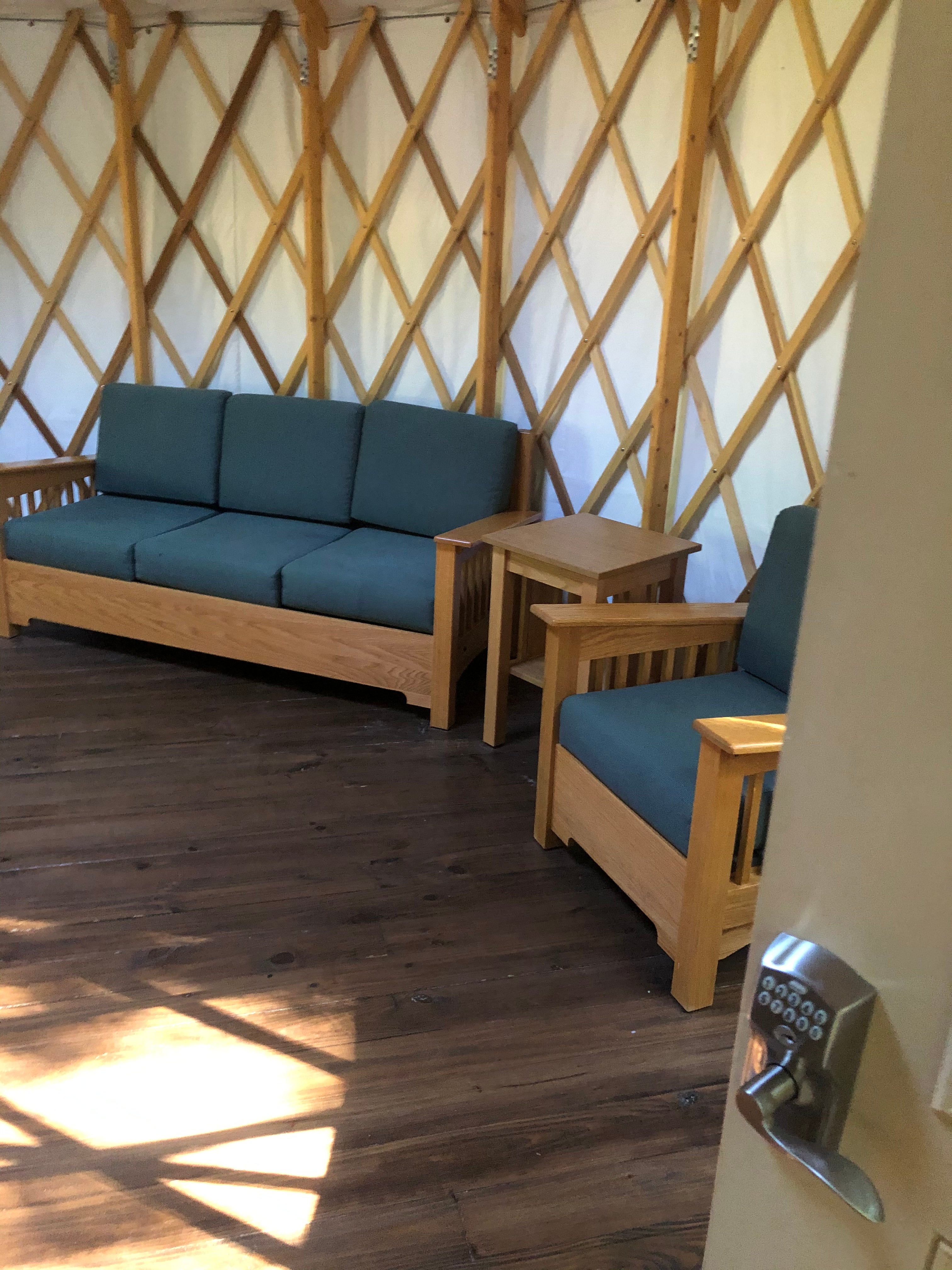 Couch and chair inside the yurt