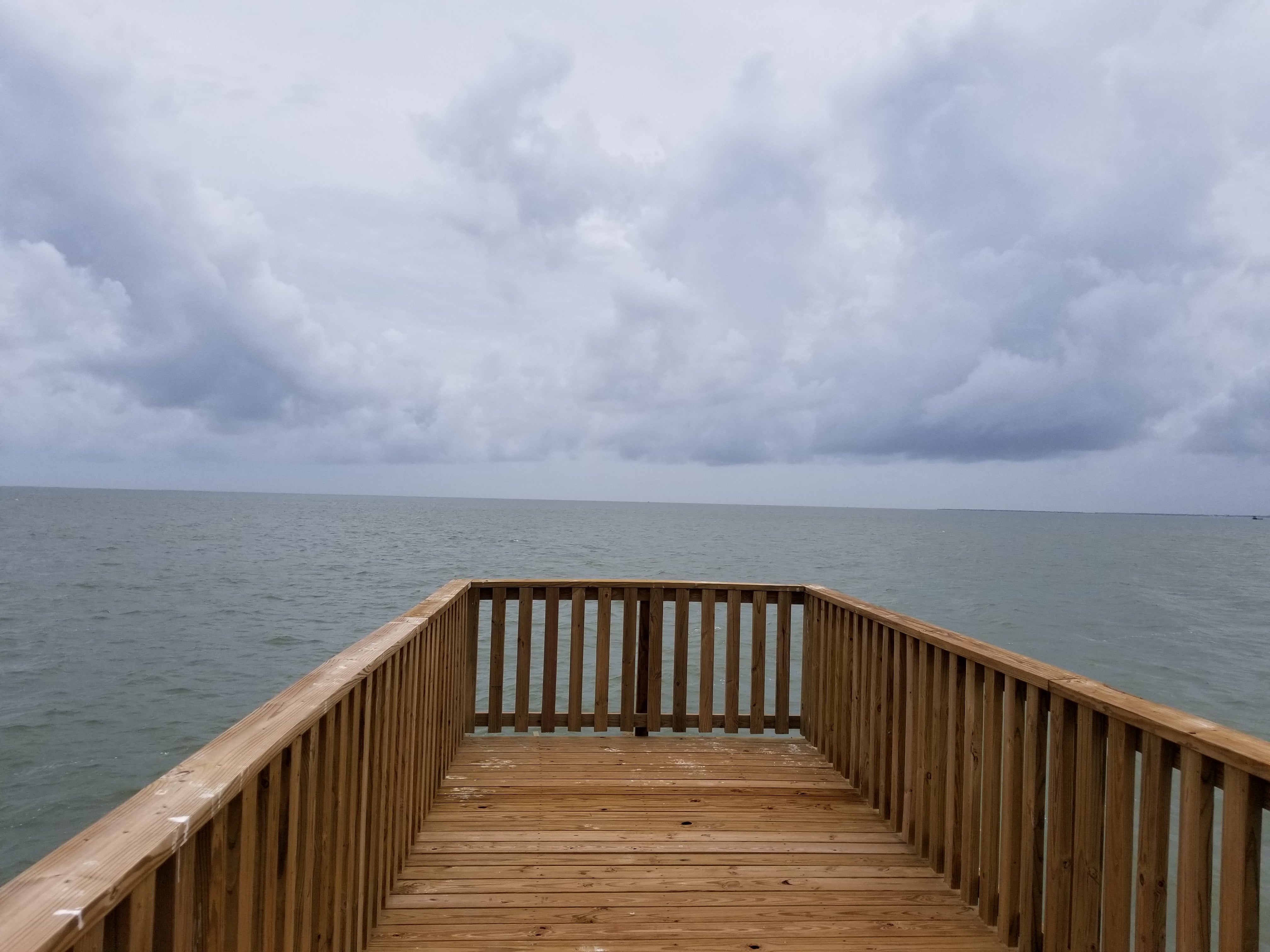 View from end of brand new (not yet open) pier.  To the left would be Saint Charles Bay, to the right would be Aransas Bay.