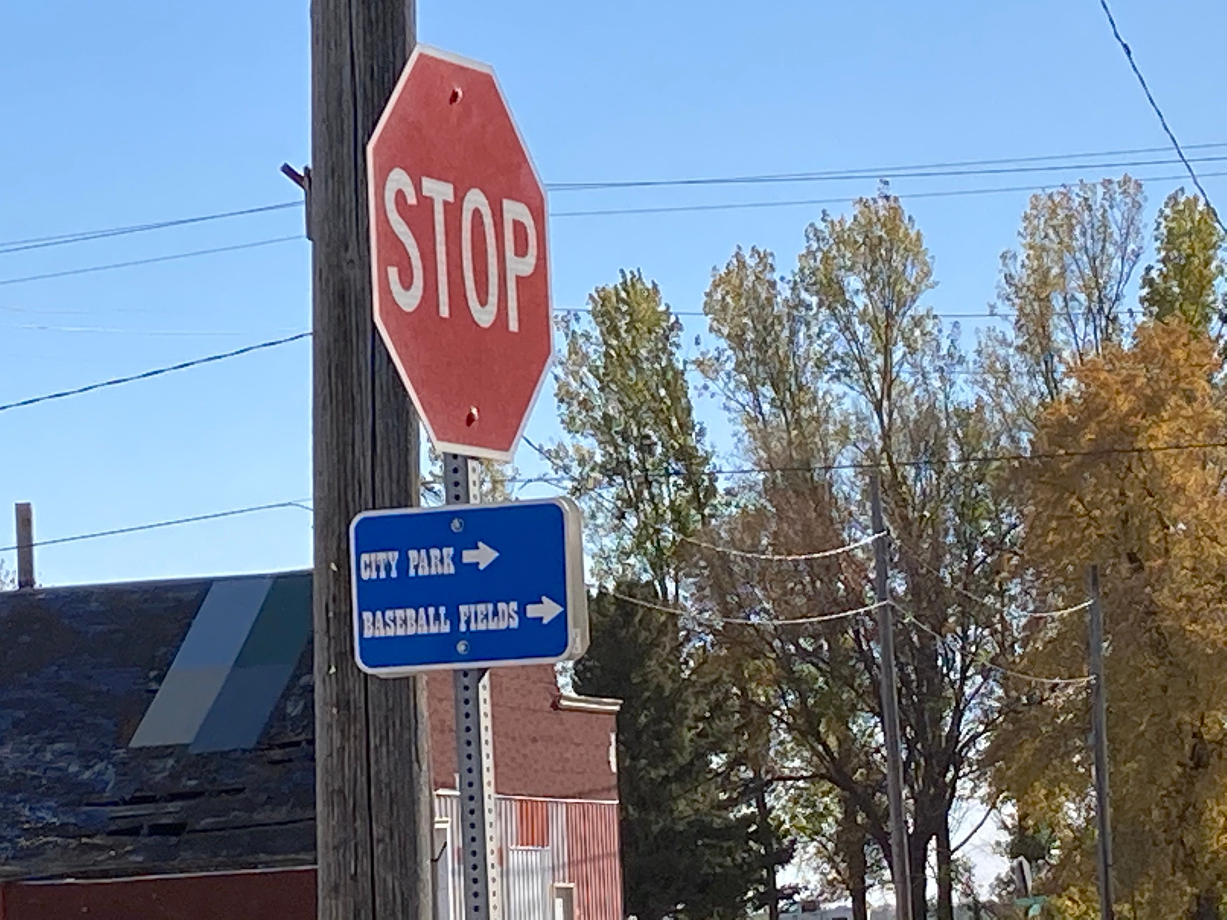 Look for this small sign at the stop sign in town, otherwise you could miss it!