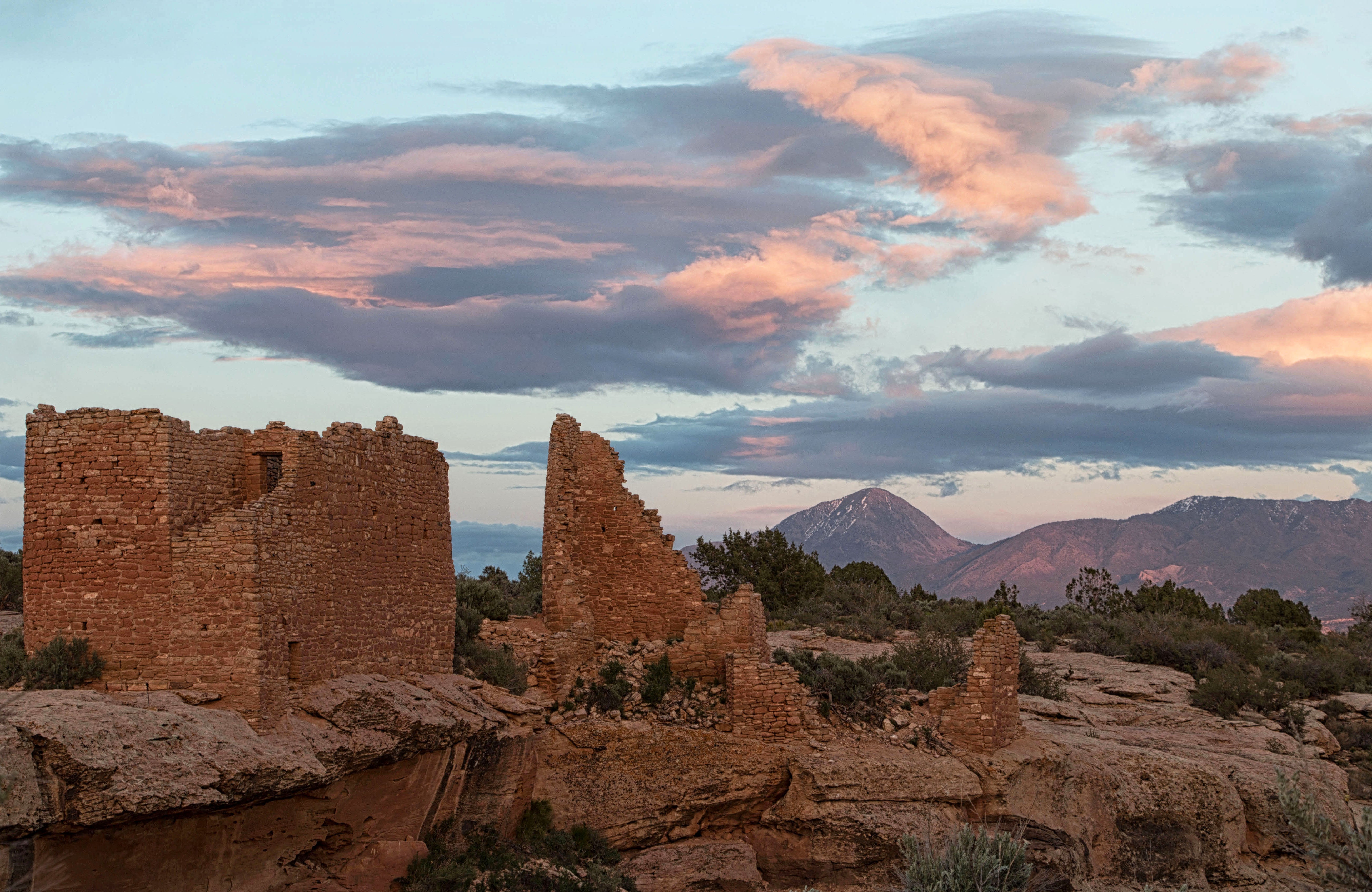 Hovenweep at sunset with Sleeping Ute Mountain in the background.
