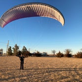 My wife getting some practice kiting her paramotor wing