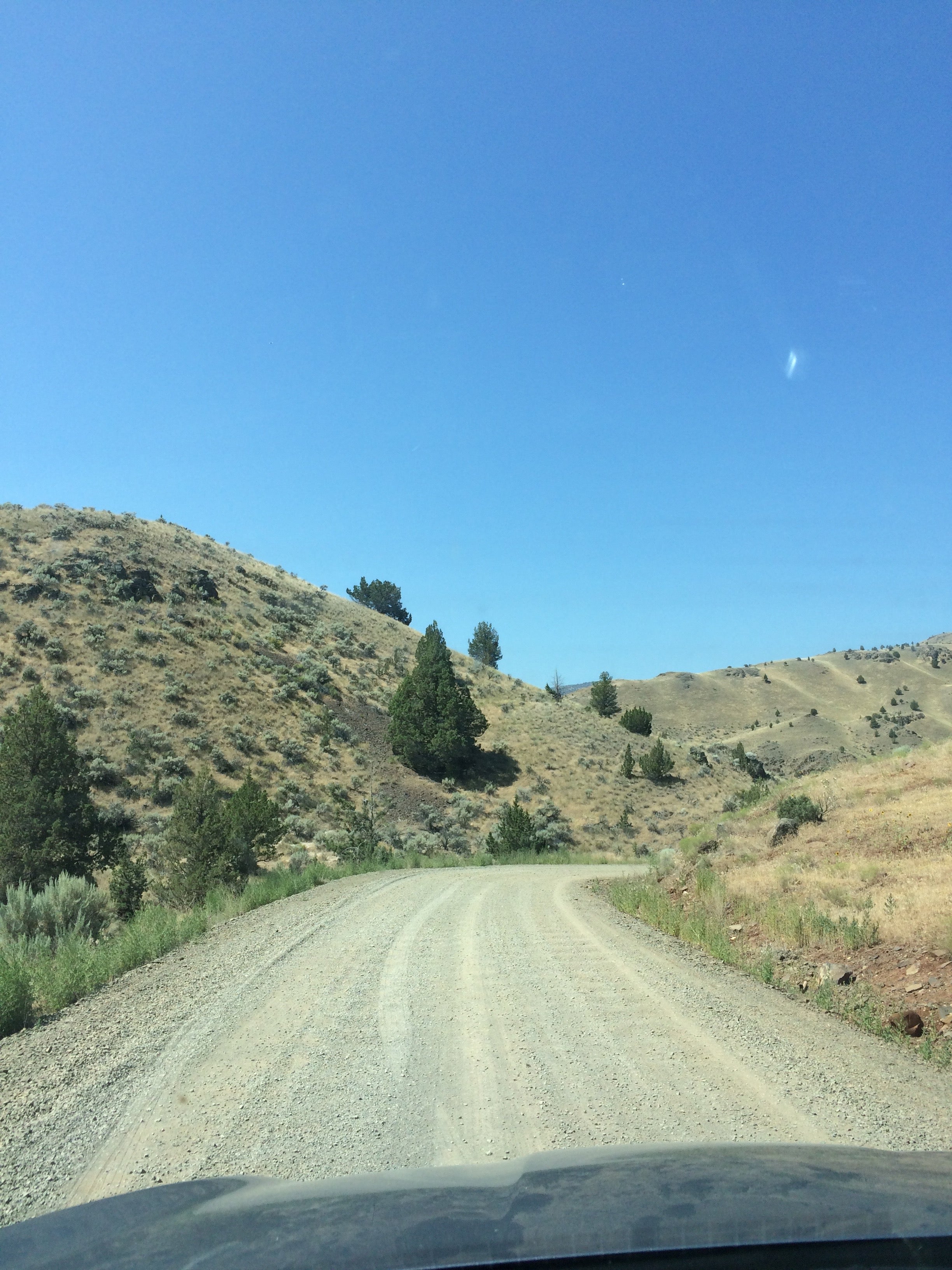 Dirt/rock road for several miles before getting to Priest Hole. Goes around some curves with slight drop-offs.