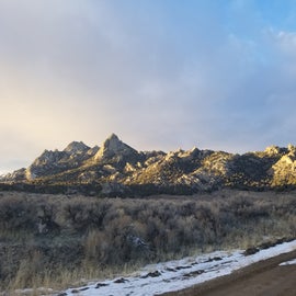 Setting sun on the ridge along the road into the City of Rocks National Preserve