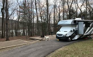 Sue's photo of camping with pets at Lake Fort Smith State Park Campground near John Paul Hammerschmidt Lake