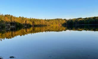 Camping near Camp Brackett: Spacious Skies French Pond, Henniker, New Hampshire