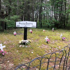 a small cemetery is near the far end of camp
