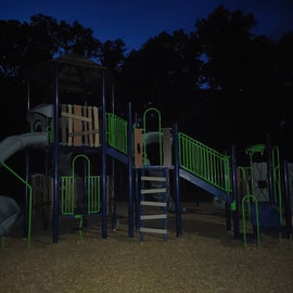 Playground photo taken at night.