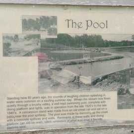 The woods have various information signs such as to draw your attention to old attractions such as the pool.