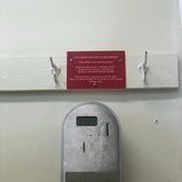 Machine with helpful sign