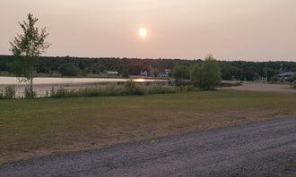Camping near Sunset Bay RV Resort and Campground : Village Park, Hubbell, Michigan