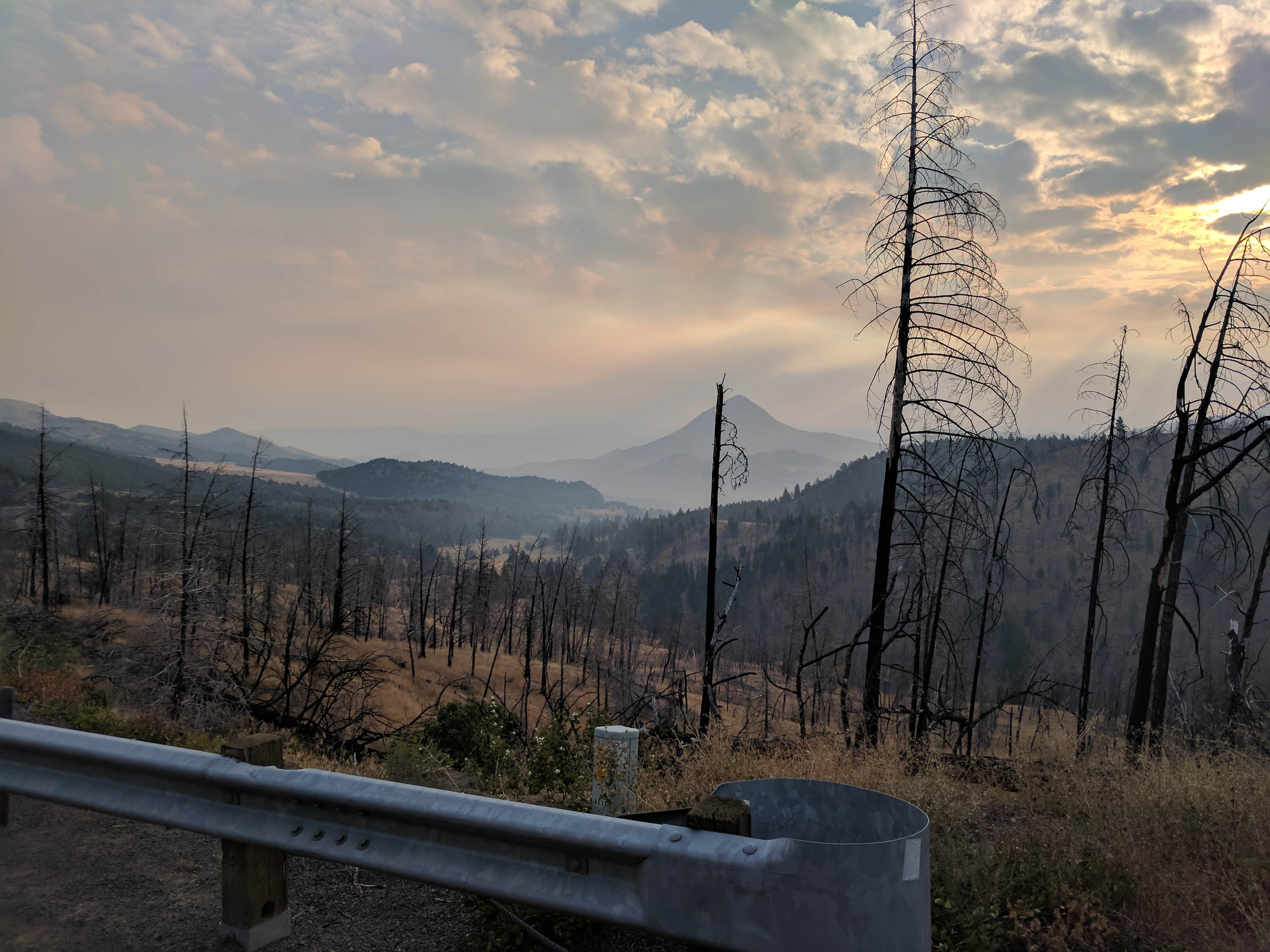 Highway 26 near the campsite, smoke covered mountains