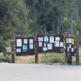 Price board and campground info boards.