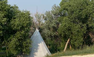 Camping near Elkhorn Springs Campground: River’s Edge RV and Cabin Resort, Evansville, Wyoming