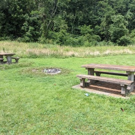 concrete picnic tables and fire pits