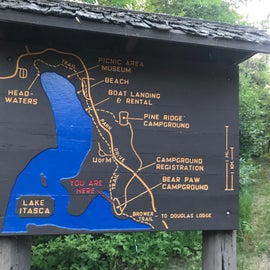 Info near the bike trail on the West side of Bear Paw camp.