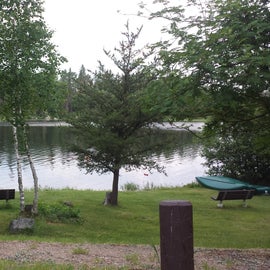 Swimming area of the lake.  You can see the canoes on the right.